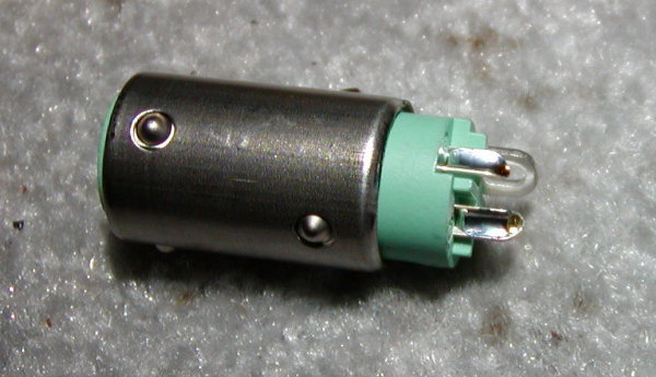 Female connector, with connector cups filled with solder, ready for soldering.